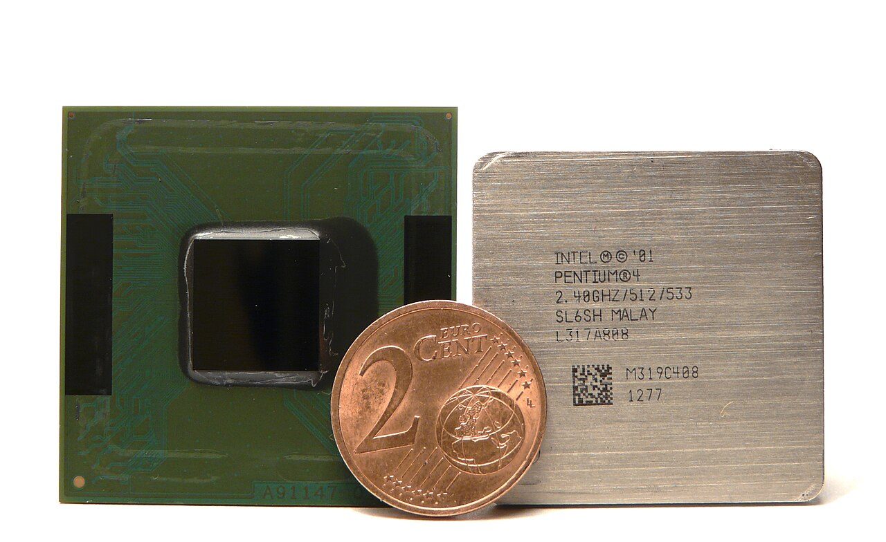 Two Pentium 4 processors beside a two-cent euro coin: one with its bare die showing, one under a metal heat spreader marked Intel Pentium 4